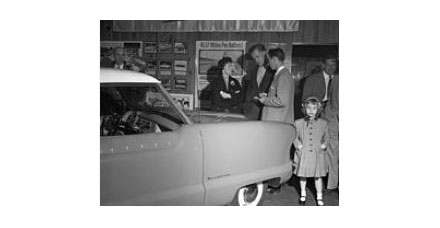Nash dealership with a Metropolitan visible, 1954.
